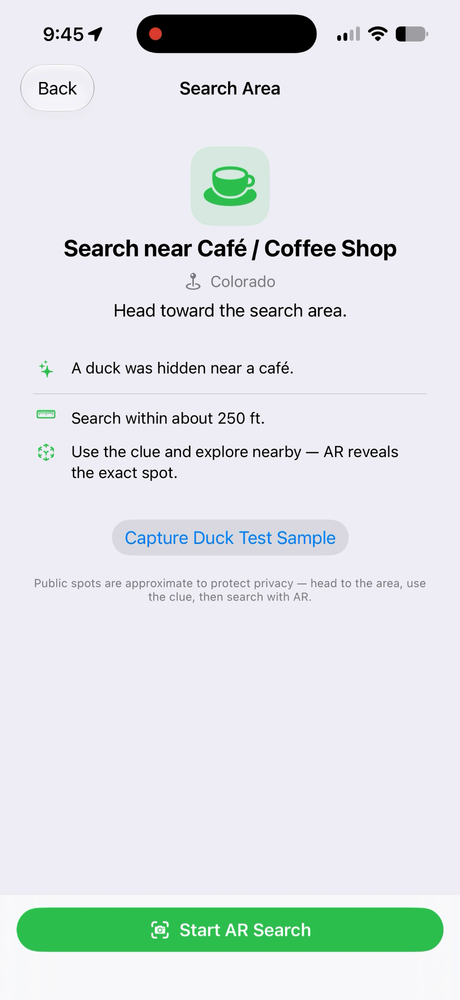 Paddo Search Area screen showing a café clue, nearby search guidance, and the Start AR Search button